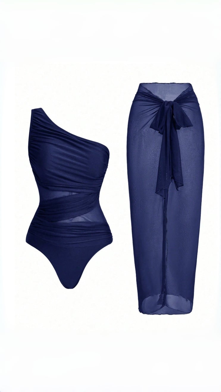 🔥 THE CUTOUT & SARONG SET: ONE-SHOULDER SWIMSUIT + SHEER MESH SKIRT — YOUR MOST DRAMATIC BEACH ENTRANCE 🔥