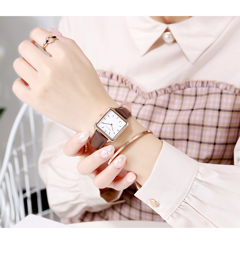 Vintage-style square-faced women's quartz watch with a steel bracelet and Japanese movement