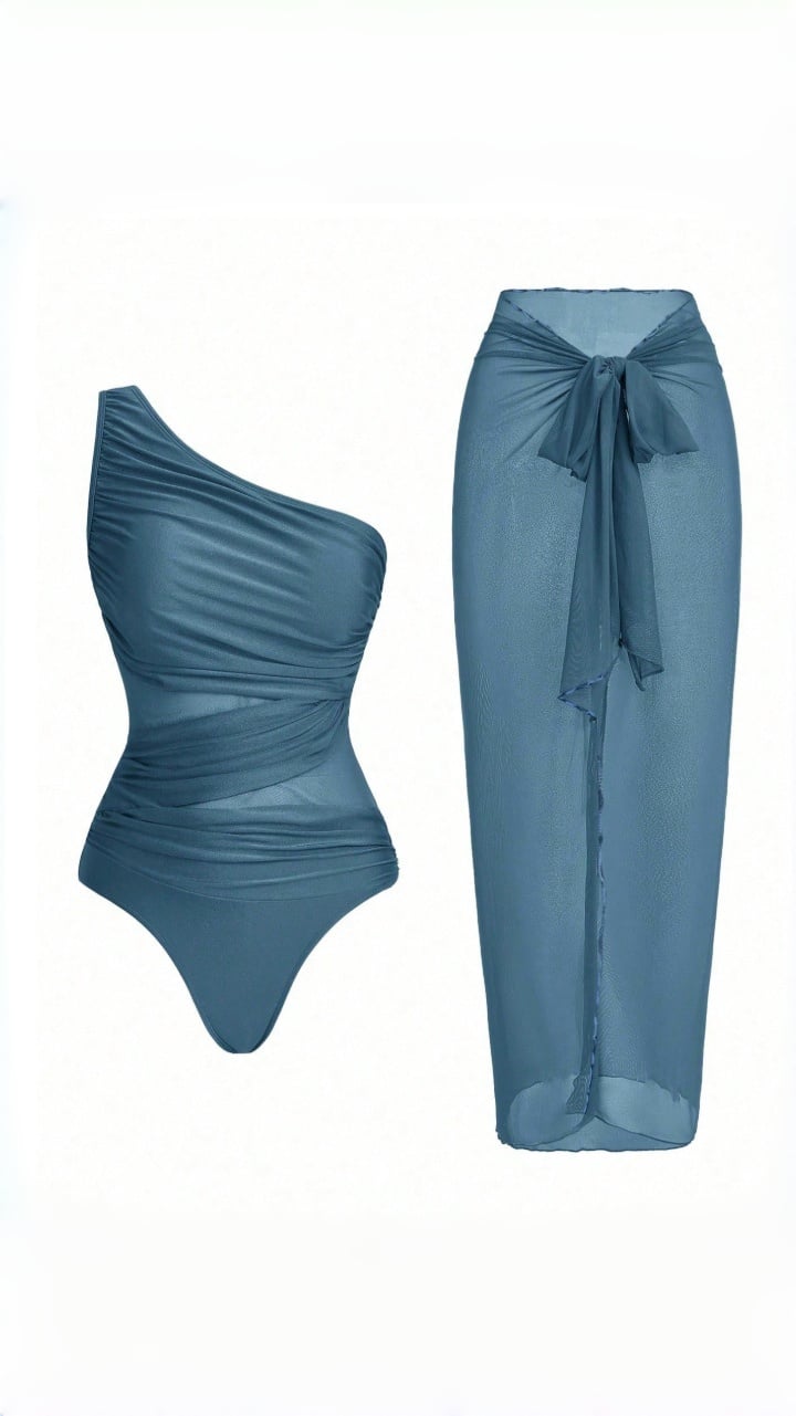 🔥 THE CUTOUT & SARONG SET: ONE-SHOULDER SWIMSUIT + SHEER MESH SKIRT — YOUR MOST DRAMATIC BEACH ENTRANCE 🔥