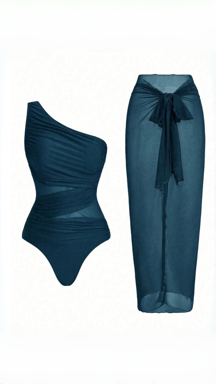 🔥 THE CUTOUT & SARONG SET: ONE-SHOULDER SWIMSUIT + SHEER MESH SKIRT — YOUR MOST DRAMATIC BEACH ENTRANCE 🔥